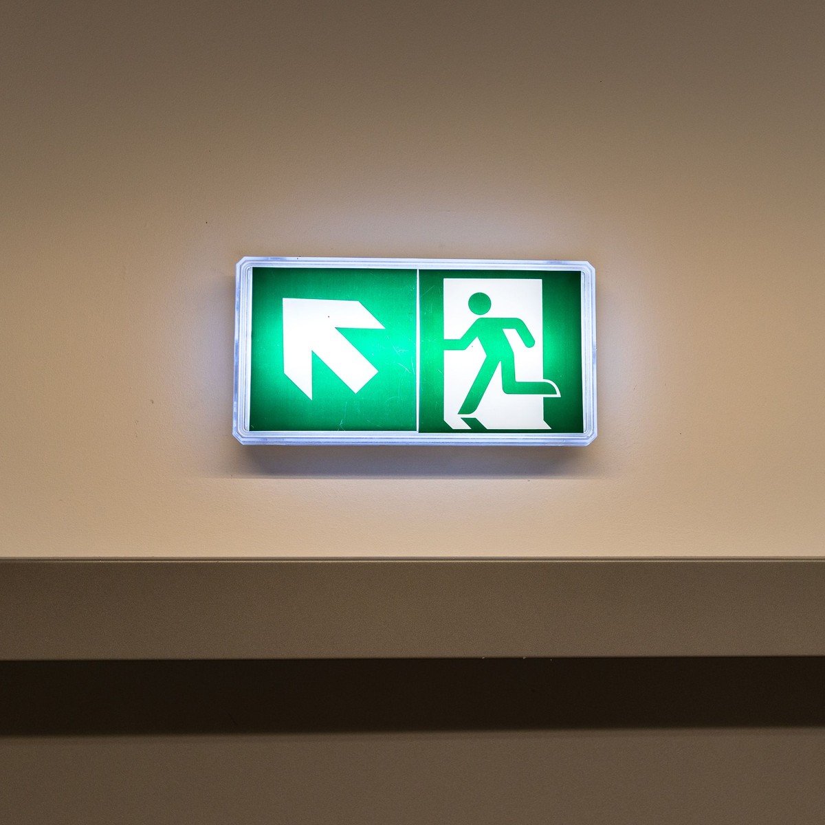 Modern LED fire exit running-man sign